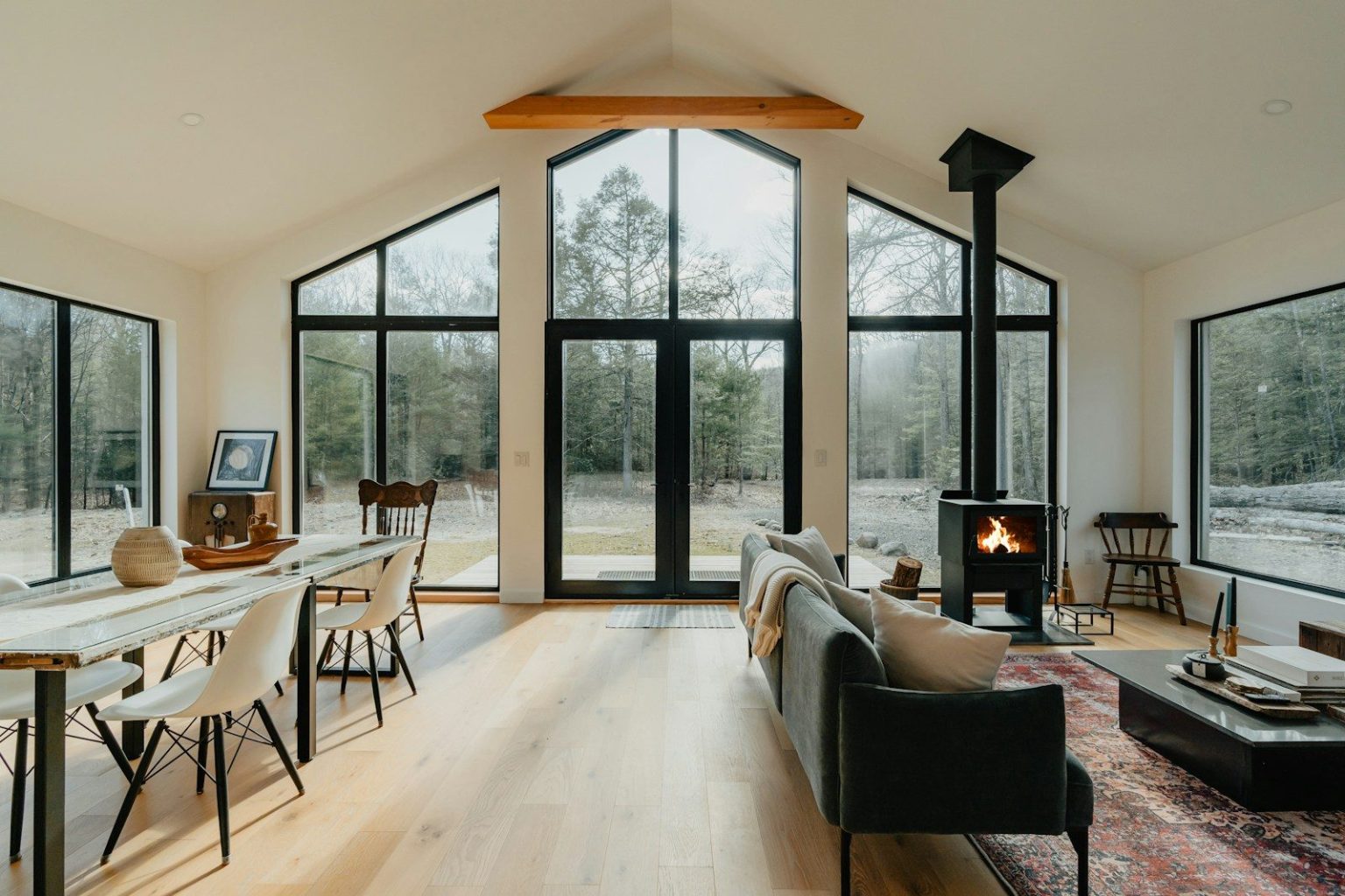 a living room filled with furniture and a fire place